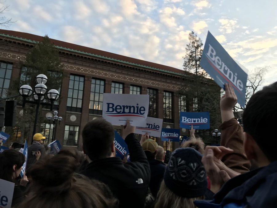 Supports cheer as Bernie Sanders brings up his plans to key issues. 